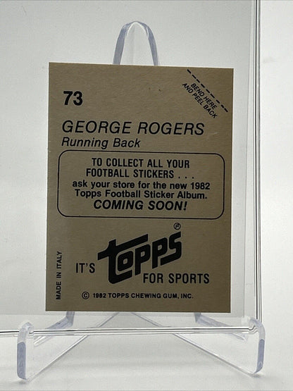 1982 Topps George Rogers Sticker Coming Soon #73 NM FREE SHIPPING